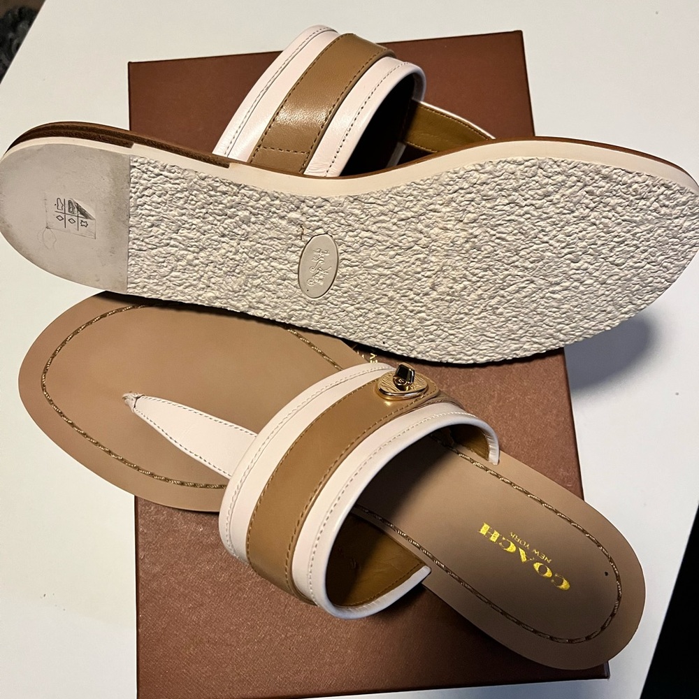 Beautiful pair of Coach slides. Never worn